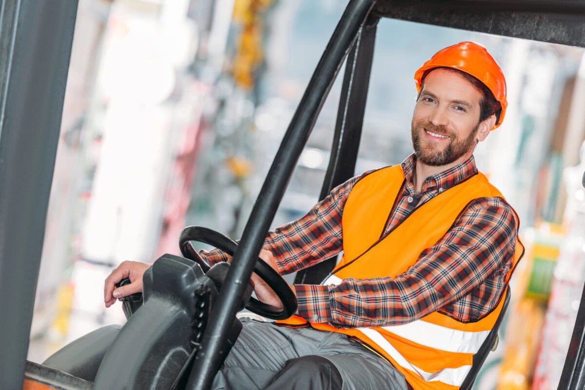 male worker wearing safety vest helmet