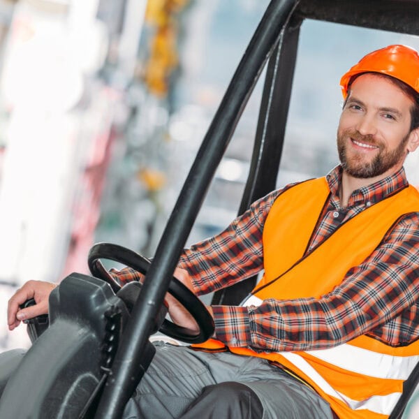 male worker wearing safety vest helmet